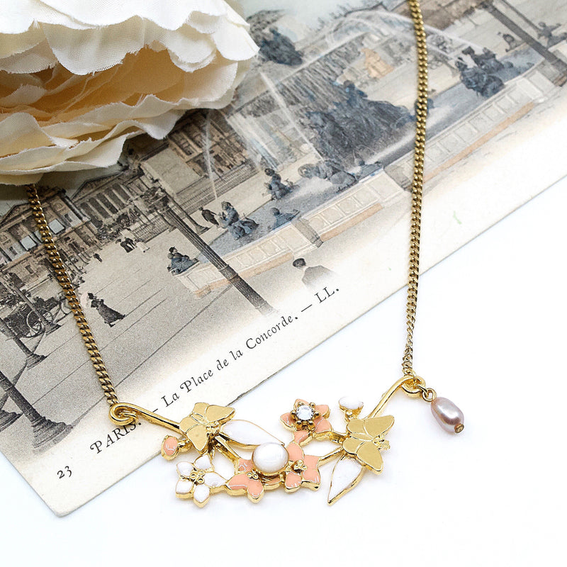Gold Flower and Butterfly Pendant Necklace by Eric et Lydie