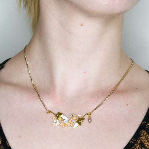 Gold Flower and Butterfly Pendant Necklace by Eric et Lydie