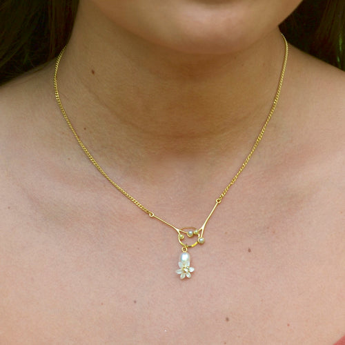 Golden Drop Pearl and Flower Necklace by Eric et Lydie