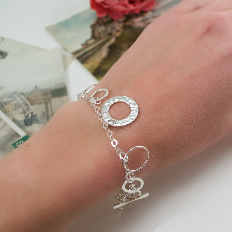 Silver Ring Charm Bracelet from Taxco, Mexico