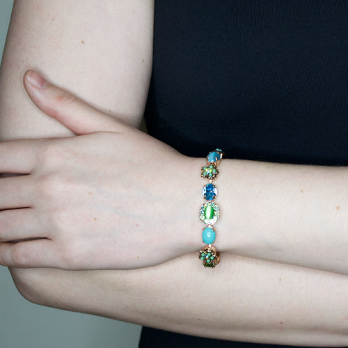Turquoise, Jade, and Cat's Eye Floral Statement Bracelet by AMARO