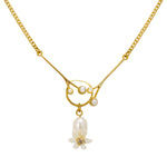 Golden Drop Pearl and Flower Necklace by Eric et Lydie