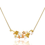 Gold Flower and Butterfly Pendant Necklace by Eric et Lydie